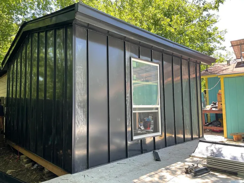 Black standing seam metal wall panels for Metal Roof Installation in Platteville