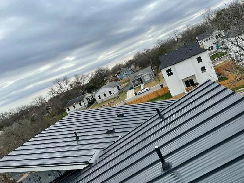 Standing seam metal roof panels with vents for Skylight Repair in Platteville
